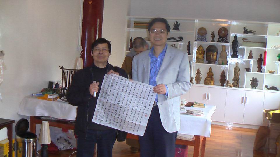 中国工笔画学会副会长谢振鸥先生与雁荡山旅游管理局党委书记吴云峰先生来我寺拜访了法大和尚(图3)